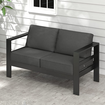 Arnhildur Braidan 53" Wide Aluminum Outdoor Loveseat with Cushions by Wade Logan