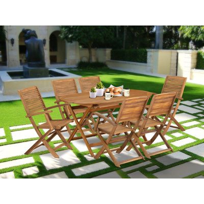 7 Piece Patio Dining Set Includes an Oval Acacia Table and 6 Folding Arm Chairs by Winston Porter
