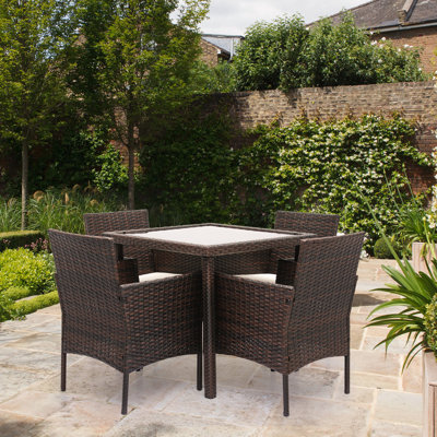 Etoy 5 Pieces Patio Dining Set, Outdoor Rattan Furniture Set w/ Glass Top Table and Cushioned Chairs