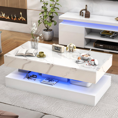 Hanscom High Gloss Marble Coffee Table with LED Lights and Drawers by Ivy Bronx