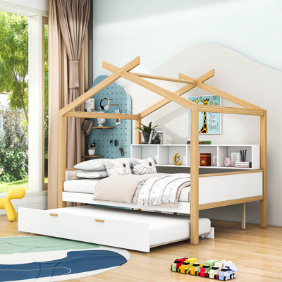 Abelardo Full Size Wooden House Bed with Twin Size Trundle and Shelves by Isabelle & Max