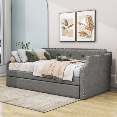 Venancio Twin Size Upholstered Daybed with Twin Size Trundle and Slat Support by Latitude Run