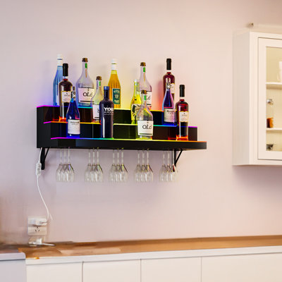 Jhonen Wall Mounted Wine Bottle & Glass Rack in Black by Ivy Bronx