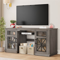 Leanne 3-Sided Glass Media Entertainment Center Console TV Stand for TVs up to 65" W Glass Doors by Laurel Foundry Modern Farmhouse