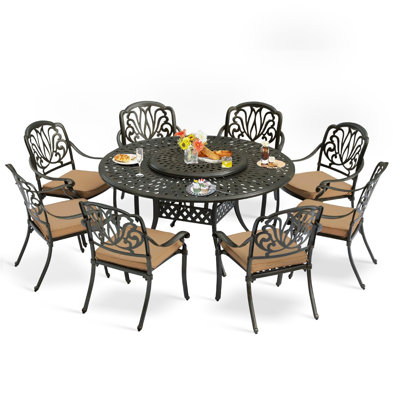 9-Piece Dining Set includes 1 round table with detachable lazy susan, 8 cushioned chairs by Bloomsbury Market