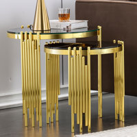 White Glass Nesting End Tables With Mirrored Silver Metal Legs by Everly Quinn