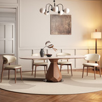 Giese Rock plate dining table and chair combination by Corrigan Studio