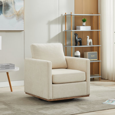 Wide Upholstered Swivel Armchair by Latitude Run