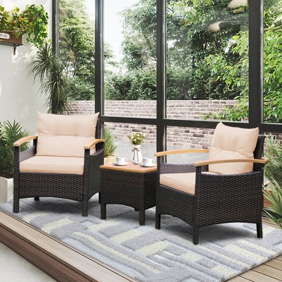 Winston Porter Patiojoy 3pcs Patio Rattan Furniture Set Wooden Armrest Table Top Cushioned Deck Beige