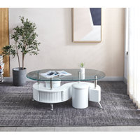 Patrizi Oval Glass Top Coffee Table by Ivy Bronx