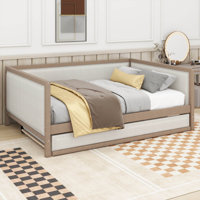 A Full-Sized Upholstered Daybed Complete With A Pull-Out Trundle Bed by Lark Manor