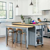 Kitchen Island with Extendable Dining Table by Lark Manor