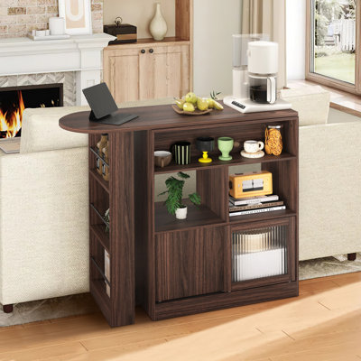 39.37" H Walnut Bar Cabinet With Rotating Top Glass Door Wheels And Shelves by Ebern Designs