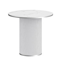 Modern 31.5" fluted round dining table with a silver outline by Wrought Studio