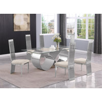 High Class Dining Set With Clear Glass Table And Stainless Steel Frame by Orren Ellis
