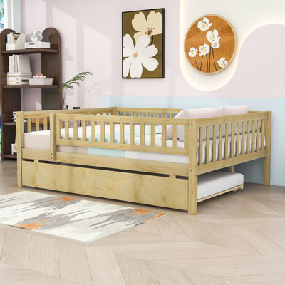 Wooden Daybed with Roll-Out Trundle and Safety Guardrails by Harriet Bee
