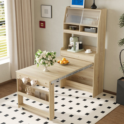 A Foldable Dining Table With A Top Cabinet And A Multi-Functional Sideboard by Ebern Designs