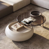 50.39" Modern Swivel Coffee Table with Tempered Glass Top by Orren Ellis