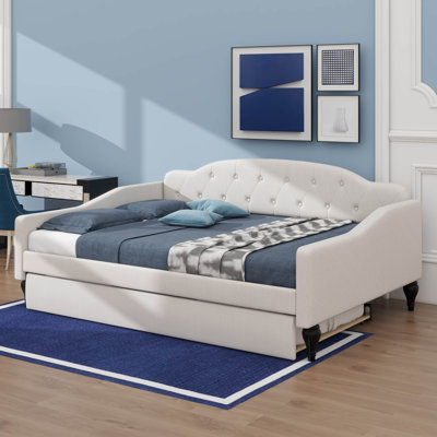 A Full-Size Upholstered Daybed Integrated Twin-Size Trundle by Darby Home Co