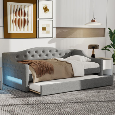 Twin XL Upholstered Daybed with Trundle and Ambient Lighting Feature by Lark Manor