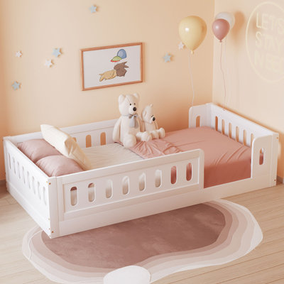 Wood Twin Size Platform Bed with Guardrail by Harriet Bee