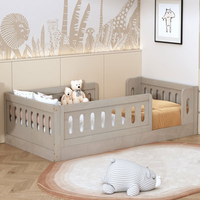 Wood Twin Size Platform Bed with Guardrail by Harriet Bee