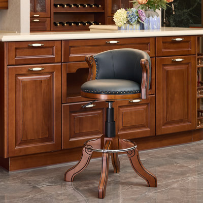 Adjustable Swivel Bar Stool in Genuine Leather with Solid Wood Frame by Alcott Hill