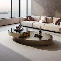 Modern Minimalist Rotating Coffee Table by Orren Ellis