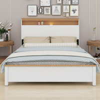 The Rustic Farmhouse Bed Frame With Storage Headboard Comes With A Built-In Charging Station by Ebern Designs