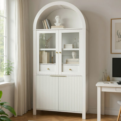 70" Tall Arched Display Cabinet With Glass Doors by George Oliver