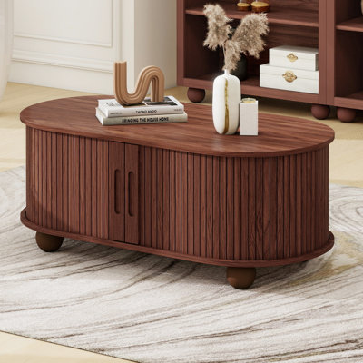 39.98 "oval Coffee Table With Storage And 360° Sliding Tambour Doors by Millwood Pines