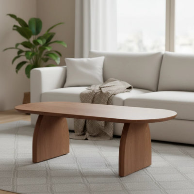 Modern Minimalist Oval Coffee Table With Sculpted Wood Legs by George Oliver