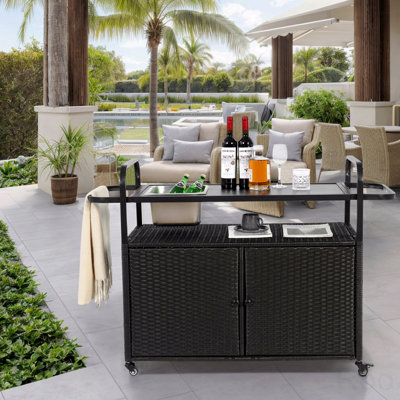 Outdoor Bar Table, Wicker Bar Cart With Cabinet, Patio Serving Cart With Steel Top, With One Ice Bucket,Lockable Wheels, Side Basket by Latitude Run