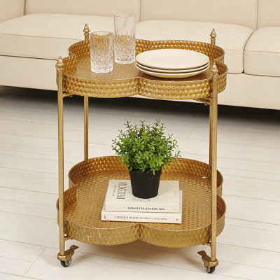Two-Tier Bar Cart With Locking Wheels, Moroccan Embossed Design And Gold Finish For Vintage Glam And Eclectic Decor by Mercer41